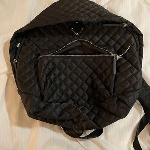 Black satiny quilted backpack